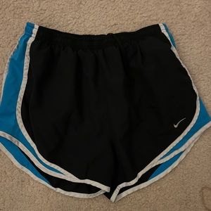 Nike Running Shorts size medium. Black blue and white